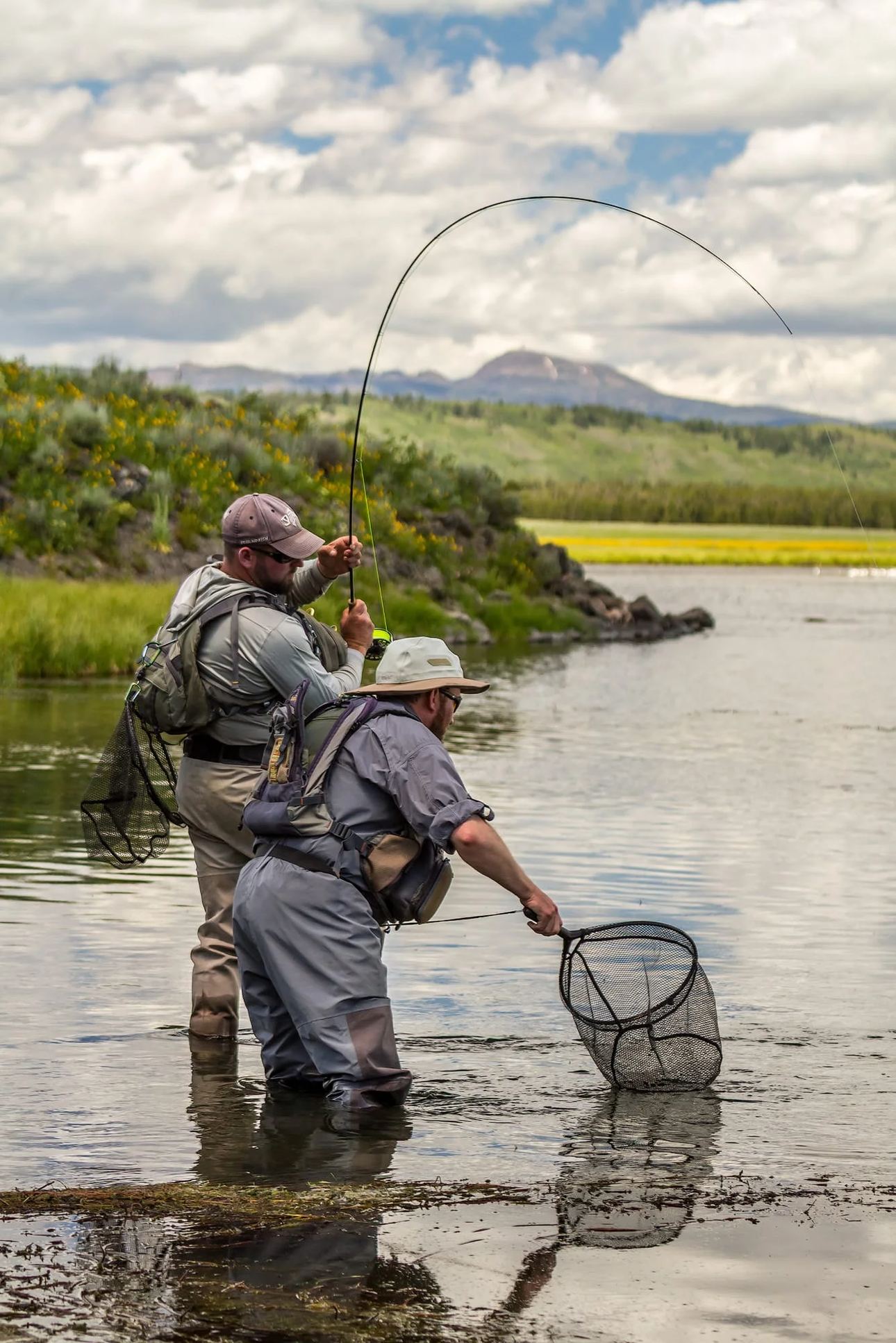 Fly fishing scene on the Henry’s Fork River with angler and net, fine art photography print by Clint Losee
