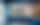 Panoramic fine art print of golden autumn mountain peaks mounted on a modern blue cafe wall.