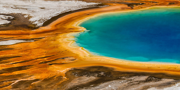The elevated hillside view of Grand Prismatic Spring in Yellowstone National Park provides a unique view down onto the spring's vividly colored rings. (Clint Losee)